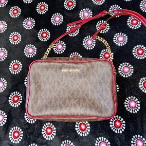 A brown & red Michael Kors Cross-body Purse
